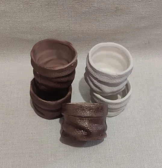 Маленькі гіпсові кашпо для стилізації інтер'єру